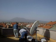 Installing a VSAT for the First Bcom project with the UNHCR in the Balkan region just after the Kosovo war where Bcom supplied VSAT terminals for voice communication of UN stations